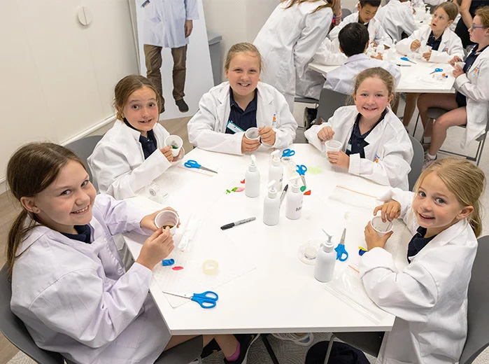 Kids sitting at a table